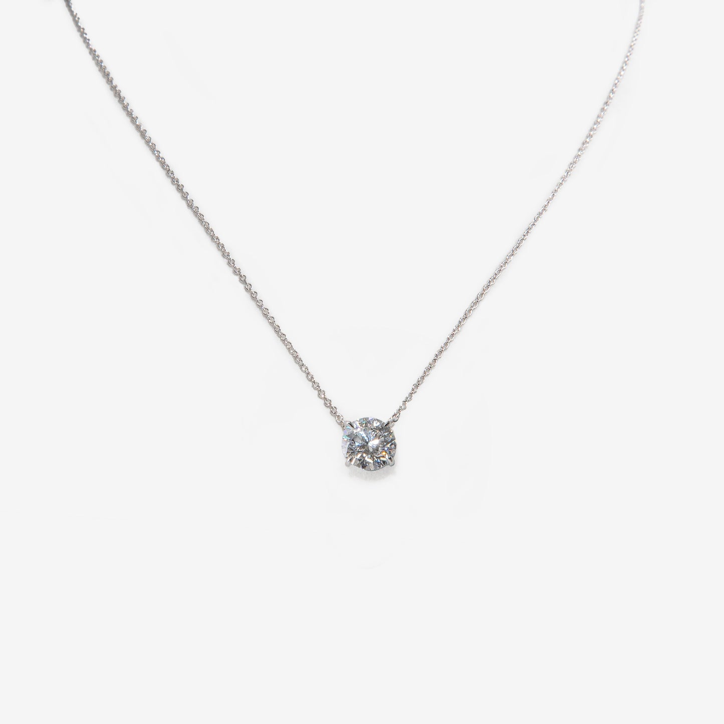 Collana in oro bianco con diamante tondo