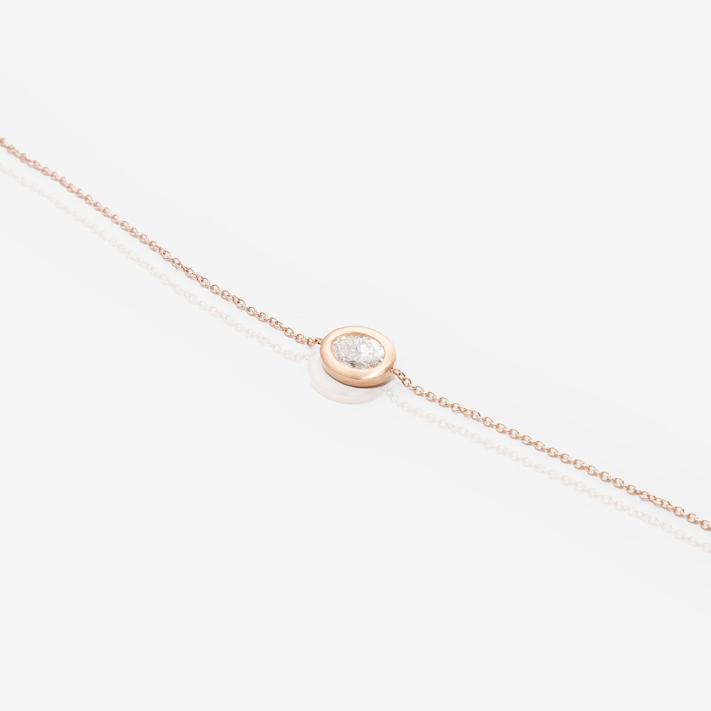 BRACCIALE IN ORO ROSA CON DIAMANTE TAGLIO OVALE